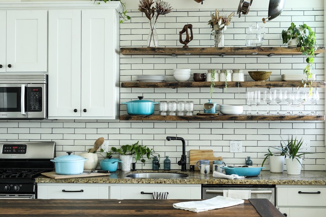 Organized kitchen shelves with neatly arranged items and containers